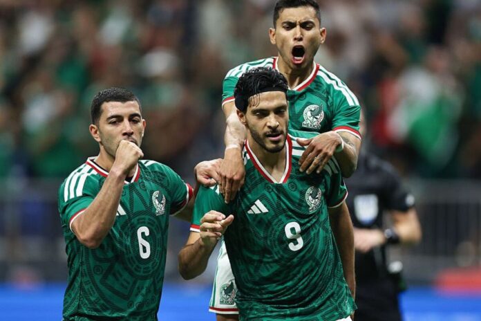 Mexican team celebrating their goal against South Africa