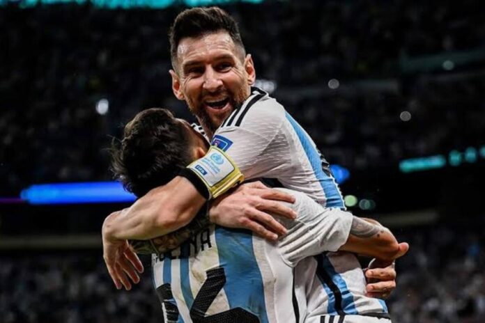 Lionel Messi celebrating with his teammate Lionel Messi celebrating with his teammate during World Cup match with Switzerland
