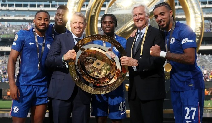 Todd Boehly and Mark Walter celebrating Club World Cup trophy with Chelsea players